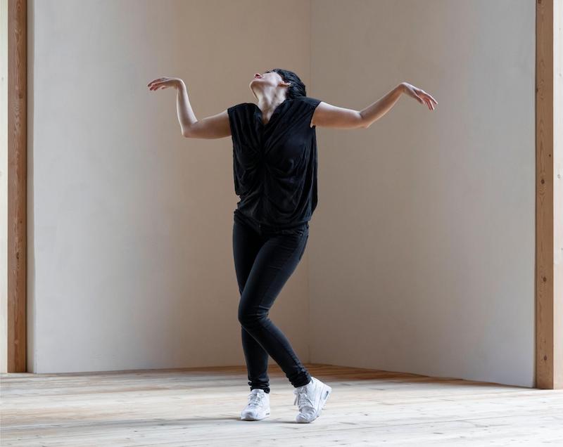 A woman dancing in a dance studio