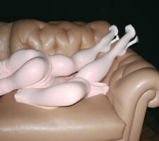 AI-generated image of a dimly lit domestic interior with what look like melting mannequin limbs