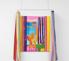 An installation view of the work ‘The Shower (Kevin & Elliot in Zipolite),’ by Navot Miller, in front of which hangs a colourful shower curtain.