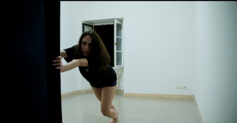 A woman pushing something