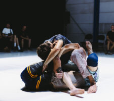 two performer entangled in each other