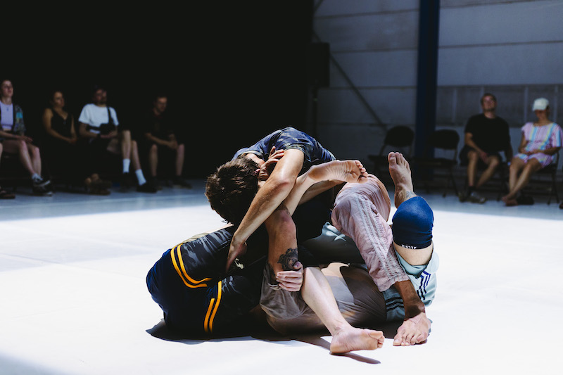 two performer entangled in each other